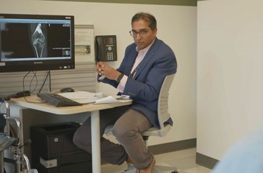 Dr. Mehta consulting patient about procedure